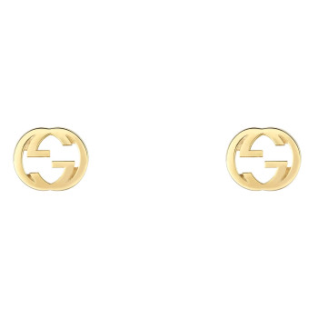 Clous d'oreilles Gucci...