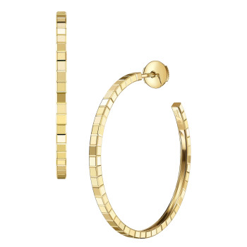 Boucles d'oreilles Chopard...
